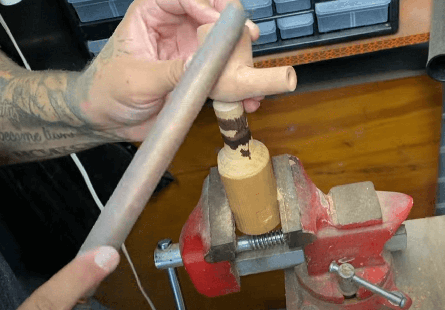 polishing smoking pipe